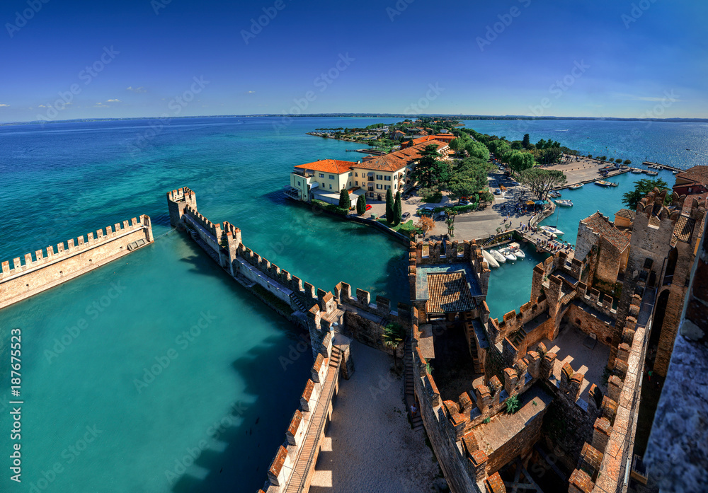 Panoramic aerial view on historical town Sirmione on peninsula in Garda lake, Lombardy, Italy