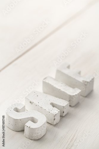 beton letters on a wooden board