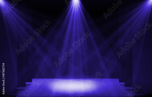 Stage lights ,free stage,concerrt stage .Several projectors on the ceiling. Spotlight strike through the darkness to the floor. photo