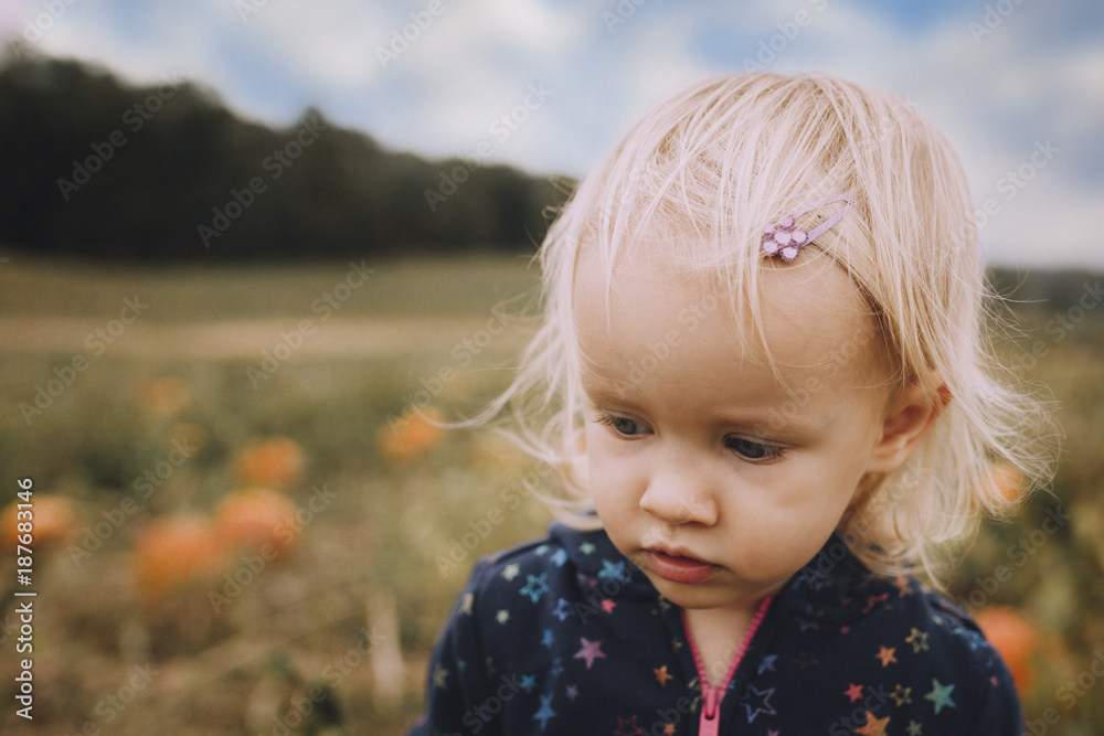 Cute baby girl at pumpkin patch Cute baby girl at pumpkin patch