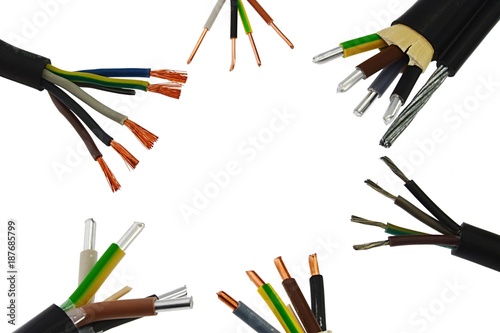 Detail of various copper and aluminium power electricity cable endings in circle, white background