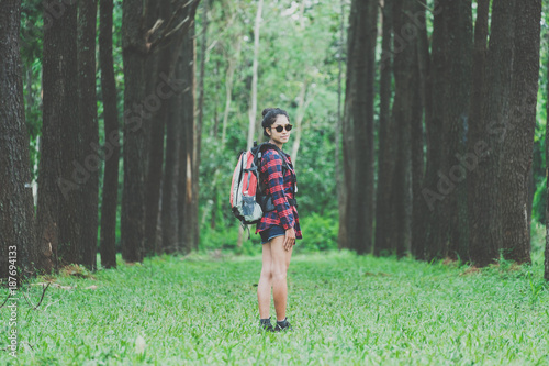 Traveling woman with backpack and eyeglasses photo