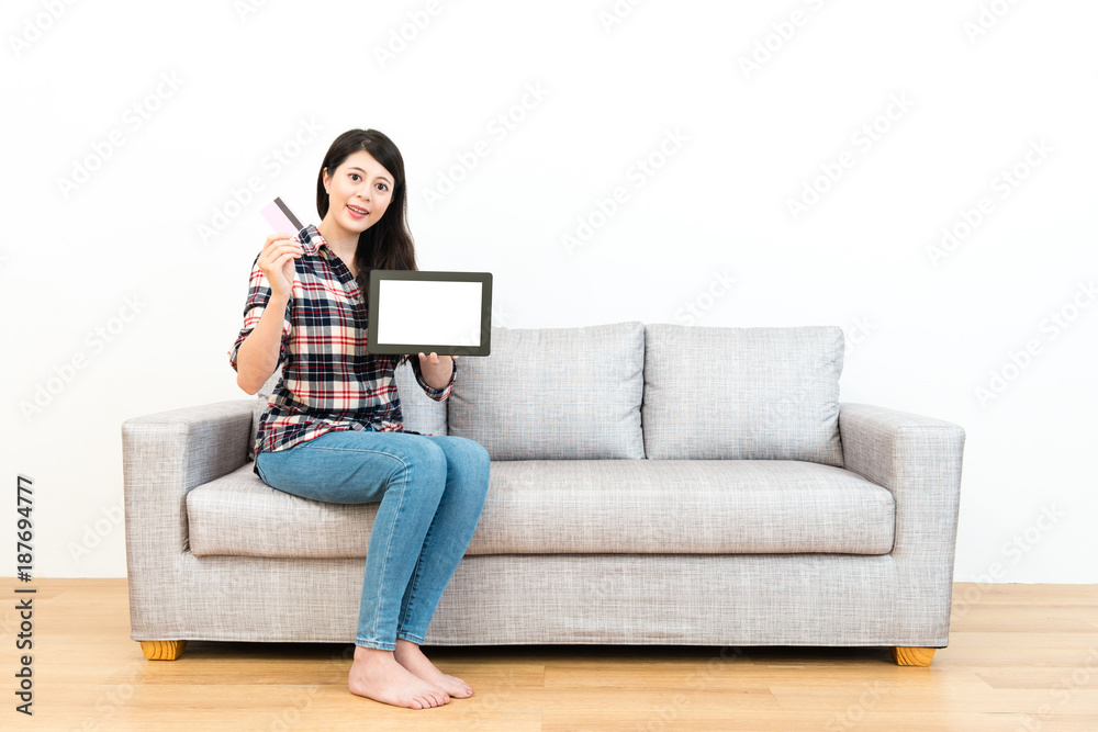 happy young girl showing online shopping concept happy young girl showing online shopping concept