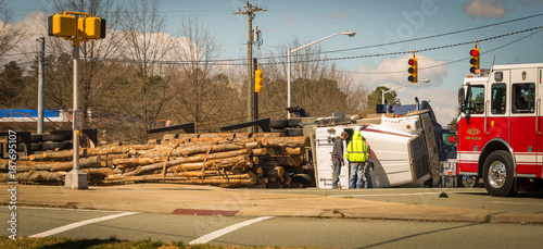 Fire truck and overturned logging truck
