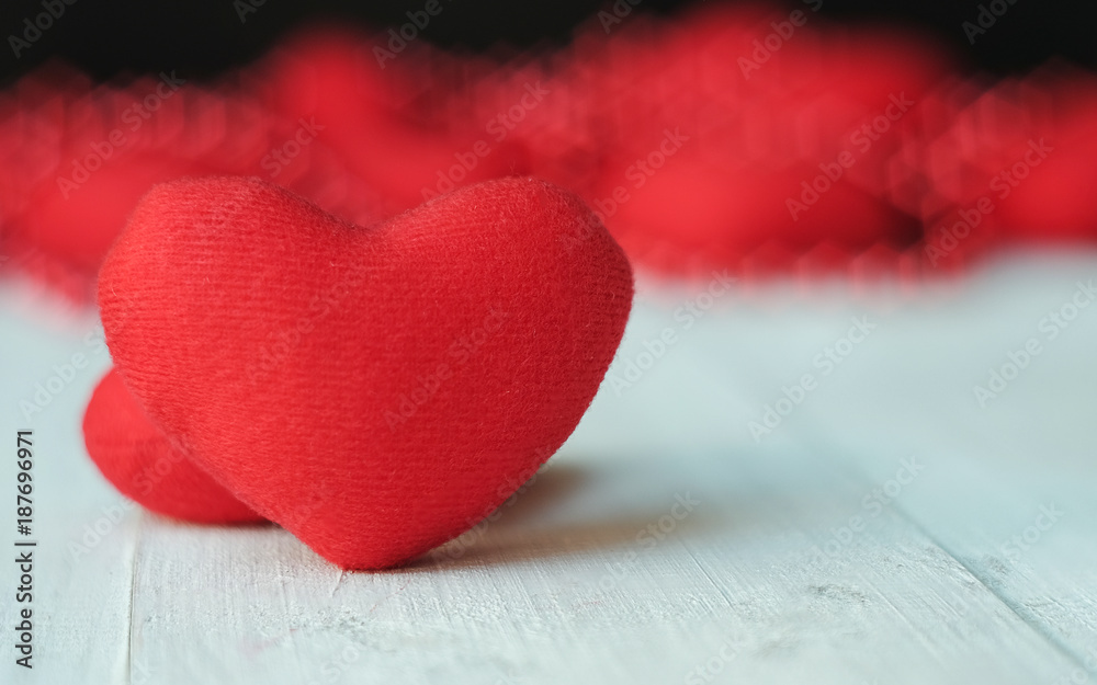 Red fabric heart on wooden background ,Valentines day background or Wedding day party Red fabric heart on wooden background ,Valentines day background or Wedding day party