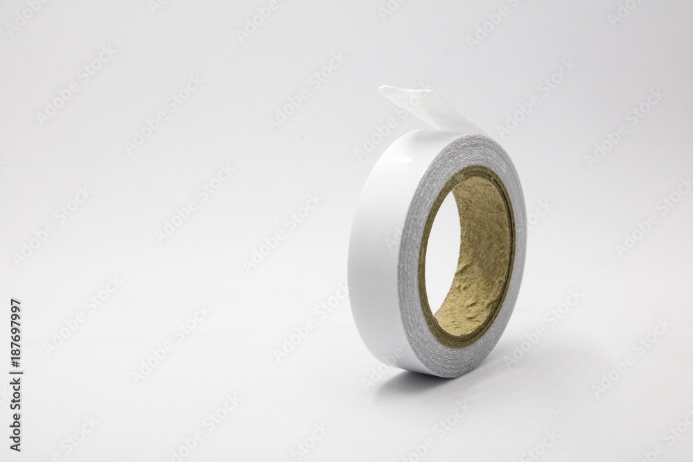 white sticky tape roll On White Background with copy space. white sticky tape roll On White Background with copy space.