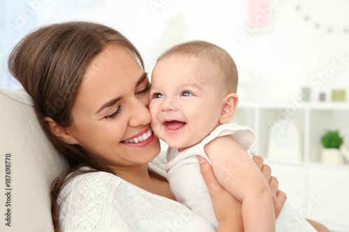 Portrait of young mother wi...