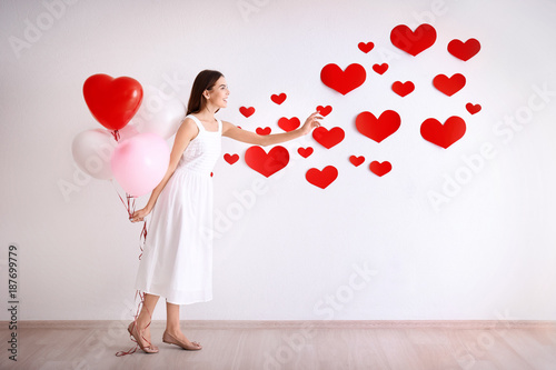 Romantic young woman with b...