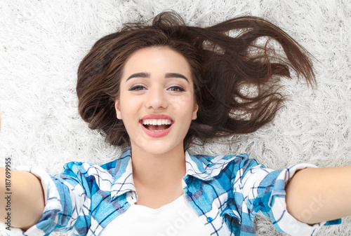 Beautiful smiling woman tak...