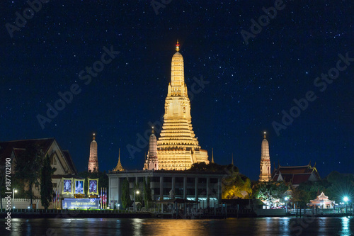 Bangkok, Thailand, 27 dec 2017 - Night time view of Wat Arun (Temple) across Chao Phraya River in Bangkok, Thailand. © golfnmd50