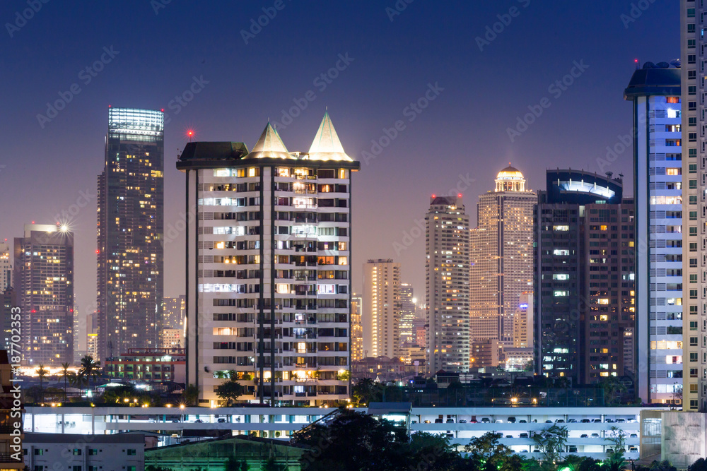 Night architecture Business office building and  Modern complex of apartment buildings  Bangkok , Thailand