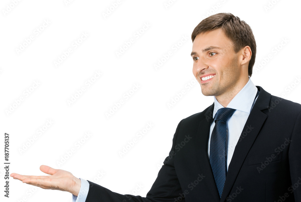 Businessman showing blank area for sign or copyspase Businessman showing blank area for sign or copyspase