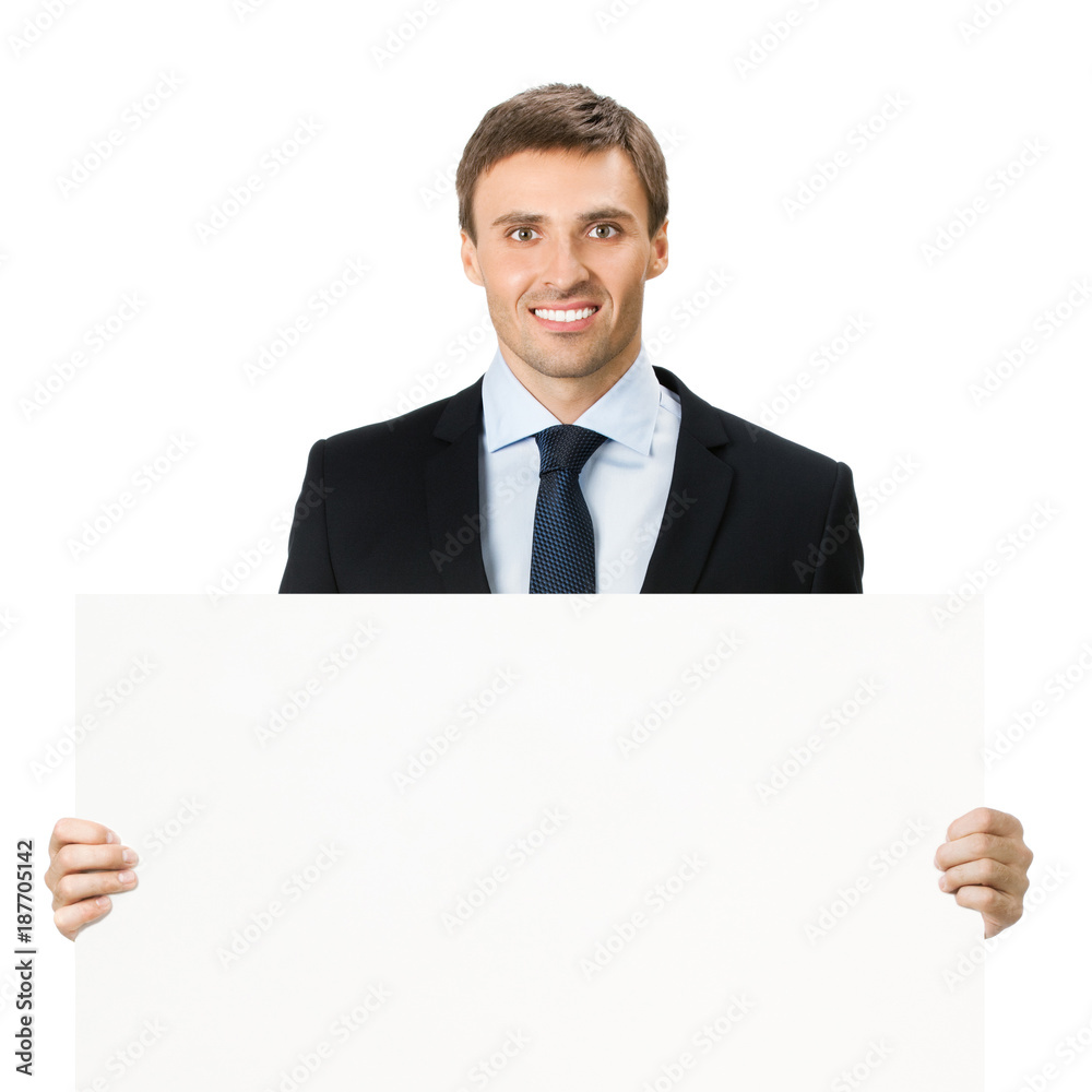 Happy businessman showing signboard, isolated Happy businessman showing signboard, isolated
