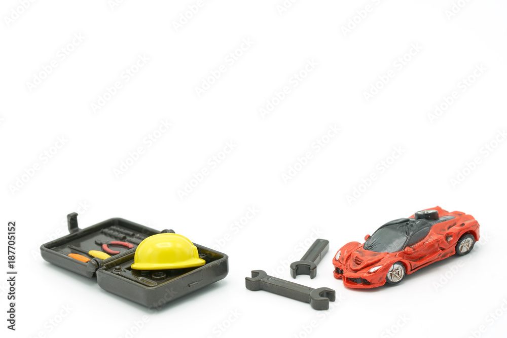 Car crash Models and Equipment Models There are yellow construction helmet models.  Car and Repair . as background Repair concept with copy space for your text or  design.