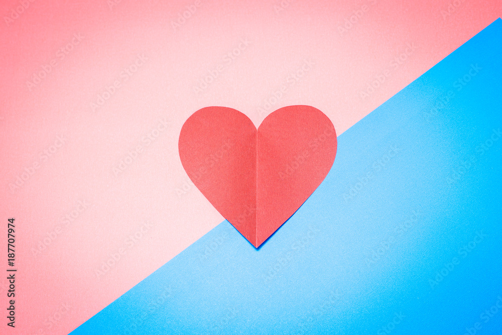 Heart on pink and blue background