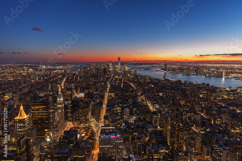 New York City skyline aerial panorama view at night with Times Square and skyscrapers of midtown Manhattan.