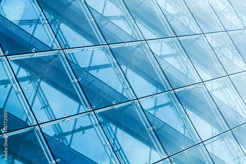 Curtain wall made of blue toned glass and steel