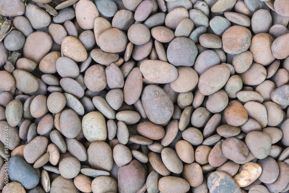 Stone pebbles texture or stone pebbles background for interior design business. exterior decoration and industrial construction idea concept design. Stone pebbles motifs that occurs natural. Stone pebbles texture or stone pebbles background for interior design business. exterior decoration and industrial construction idea concept design. Stone pebbles motifs that occurs natural.