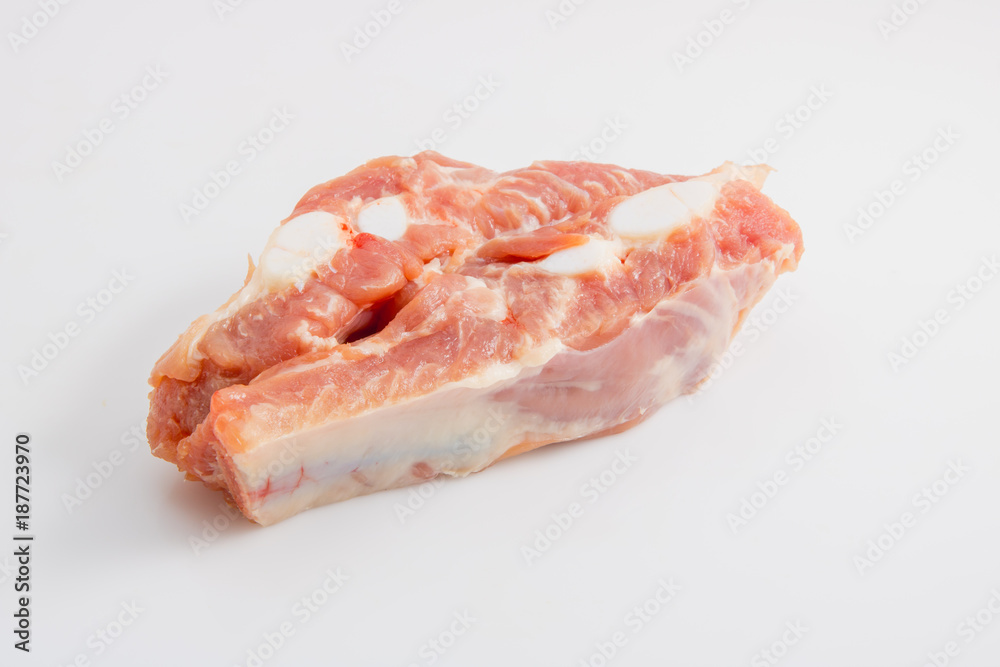 Raw pork ribs isolated on a white background Raw pork ribs isolated on a white background