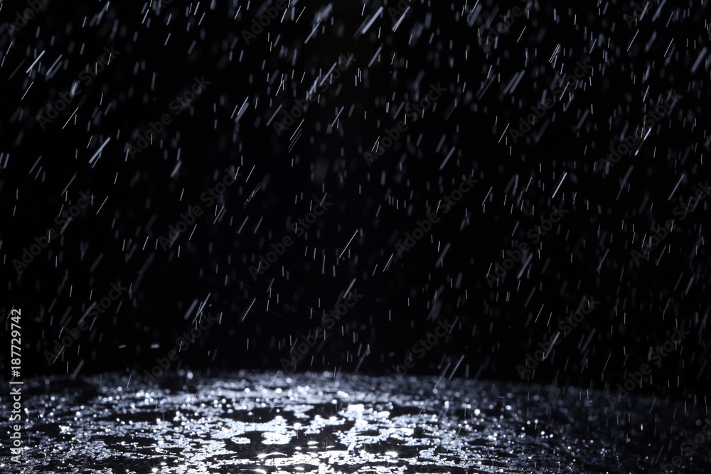 Dark background shot of rain falling - obrazy, fototapety, plakaty 