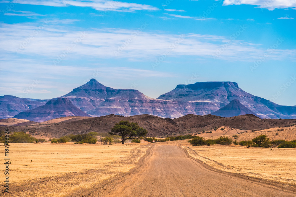 On the road toward Khorixas in the Kunene region of Northern Namibia. - obrazy, fototapety, plakaty 