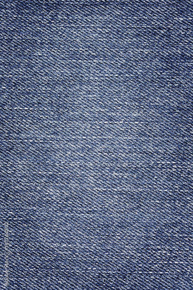 Old denim texture background in a vertical format - cotton fabric Old denim texture background in a vertical format - cotton fabric