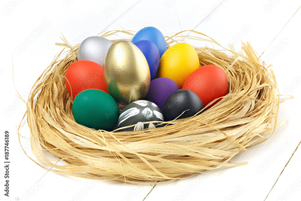 Easter Eggs On White Wooden Background. 