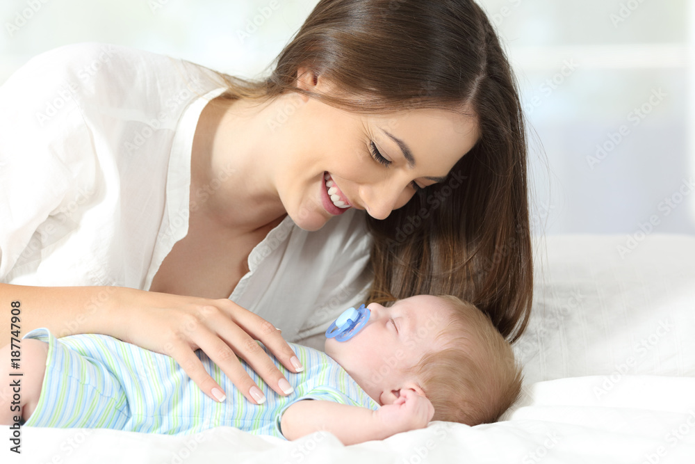 Mother enjoying with her baby sleeping Mother enjoying with her baby sleeping