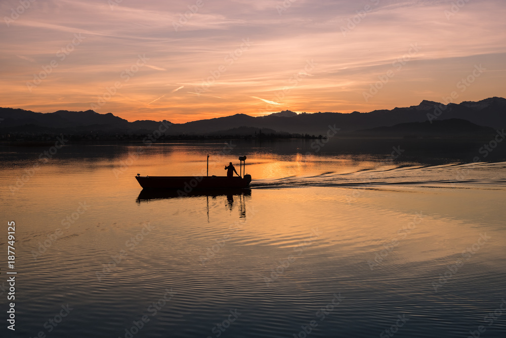 Fishing boat on the waters of the Upper Lake Zurich (Obersee), Hurden, Switzerland