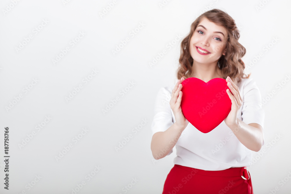 woman holding red heart woman holding red heart
