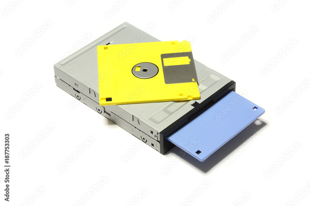 old computer floppy diskette inside floppy drive isolated on white background old computer floppy diskette inside floppy drive isolated on white background