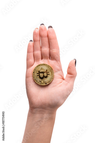 Hand holding golden Bitcoin, coin virtual money