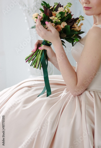 Woman in beautiful dress ho...