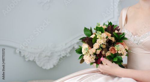 Woman in beautiful dress ho...