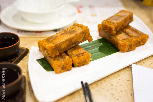 Photography Fried coconut flavor sponge cake served on the table