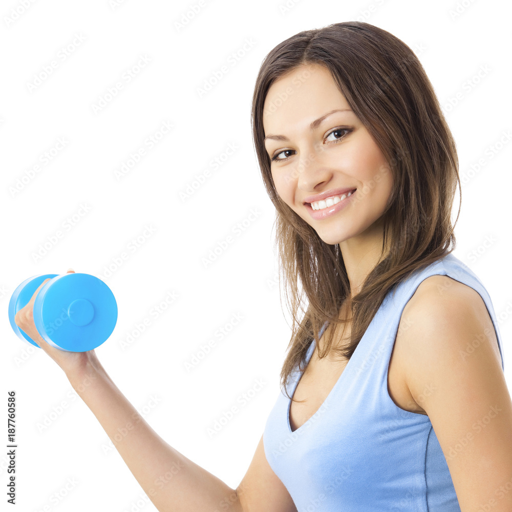 Young woman exercising with dumbbell, isolated Young woman exercising with dumbbell, isolated