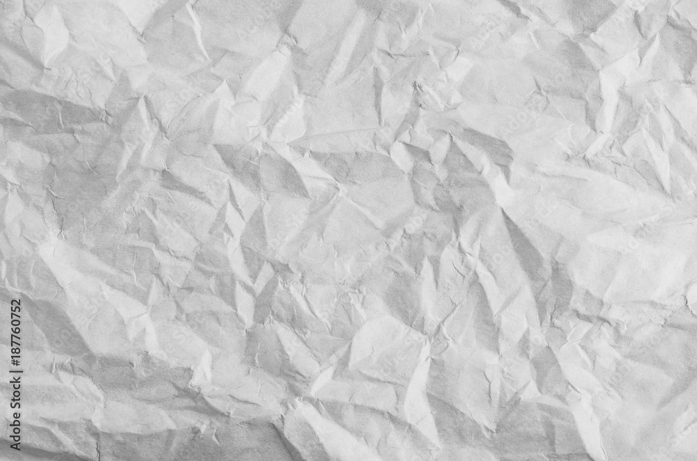 Unfolded Crumpled Paper with Creases in White Unfolded Crumpled Paper with Creases in White