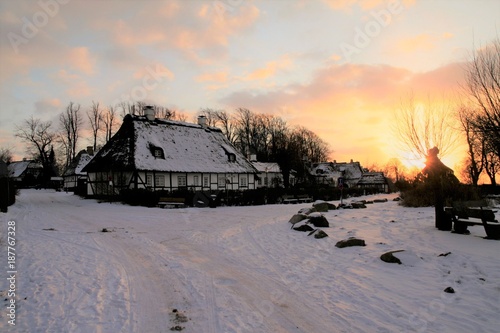 idyllische Winterstimmung im malerischer Dorf Sieseby an der Schlei beim Sonnenuntergang im Winter, Schleswig-Holstein, Deutschland. Europa photo
