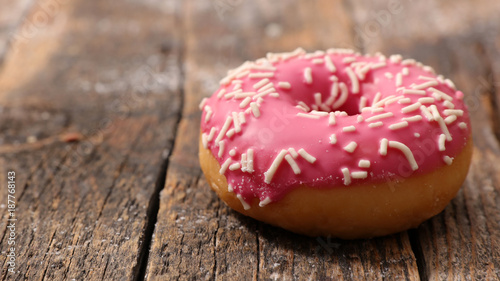 delicious donut on wood background