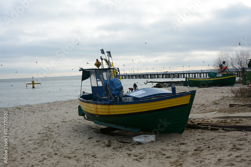 Fototapeta Naklejka Na Ścianę i Meble -  Fishing boat on the beach