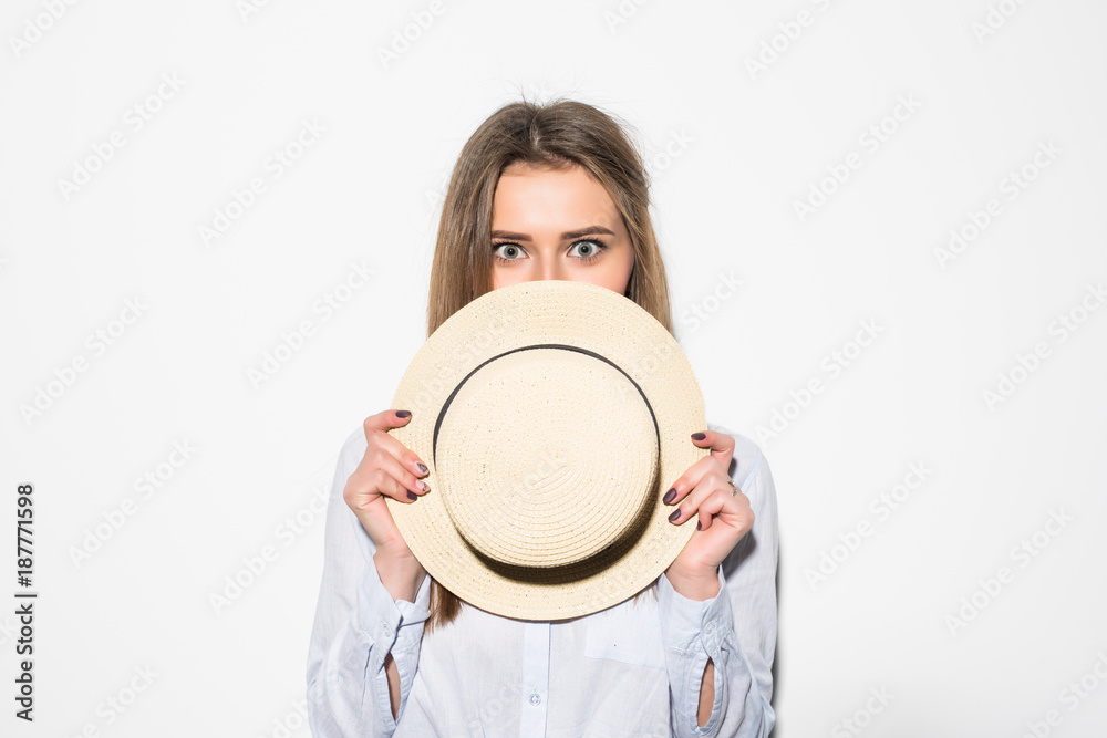 Close up beauty style portrait of smiling woman cover face with hat touching face isolated on white. Close up beauty style portrait of smiling woman cover face with hat touching face isolated on white.
