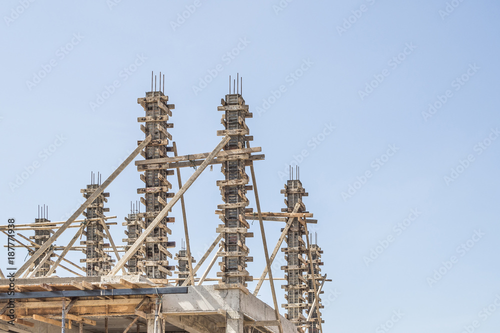 installation of cement formwork frames to new house construction at building site, real estate development