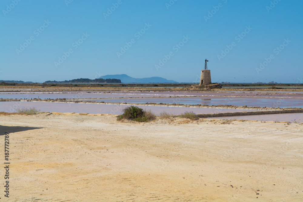 Salt mills are seen in suburbs of Marsala, Sicily, Italy.
