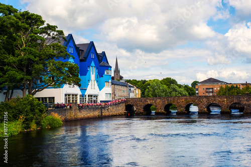 Beautiful landscape in Sligo, Ireland with river and colorful houses photo