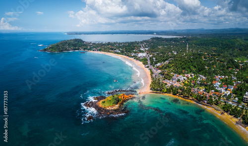 Aerial panorama of the tropical beach in the town of Mirissa, Sri Lanka