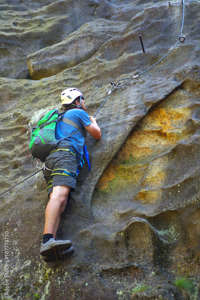 Tourist looking on the via ferrata