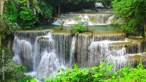Huay Mae khamin waterfall a beautiful haven of the middle of the forest in Kanchanaburi.  Thailand photo