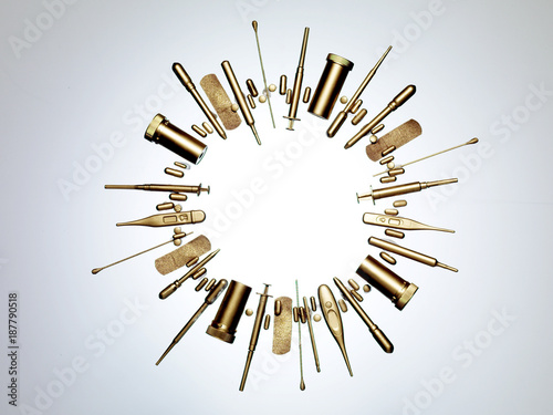 Gold color medical and healthcare items photo