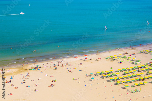 Aerial view of Rimini beach with people and blue water. Summer vacation concept.