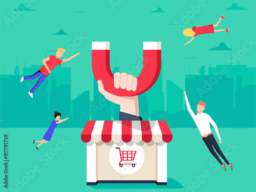 Hand with magnet attracting customers to the shop with shopping carts.